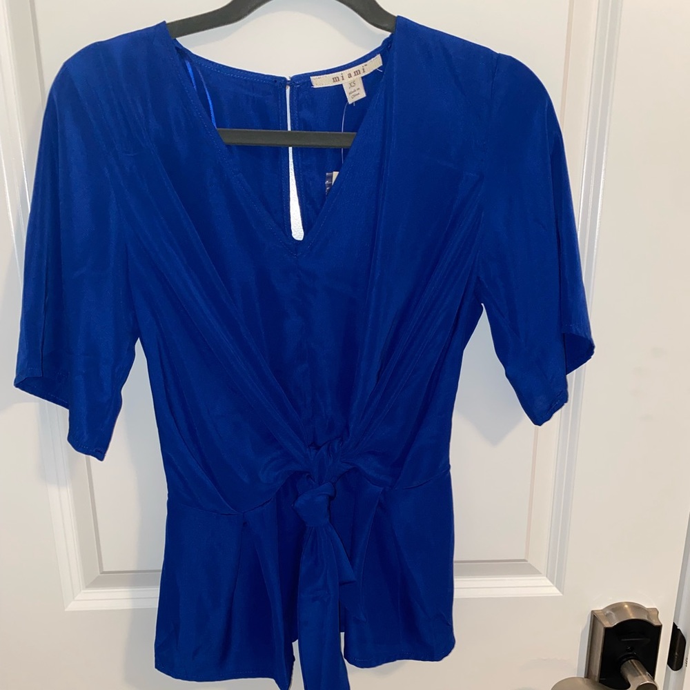 Miami blue shirt